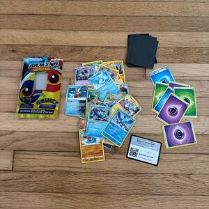 Lot of Pokémon Collectors Trading Cards & Protective Sleeves